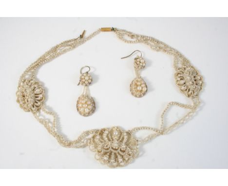 A VICTORIAN SEED PEARL NECKLACE formed with three flower head clusters, 41cm. long, together with a pair of seed pearl drop e