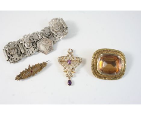 AN AMETHYST AND PEARL PENDANT the openwork lattice design centred with an oval-shaped amethyst  with small pearls, with an am