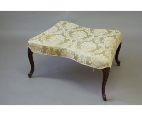 A GEORGE III MAHOGANY STOOL of French Hepplewhite design, with moulded legs, and leather castors - probably originally the ce