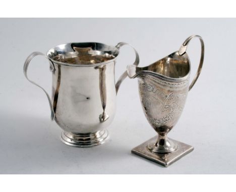 A GEORGE III BRIGHT-CUT CREAM JUG on a square pedestal foot, initialled, by George Gray, London 1786 and a two-handled cup, i