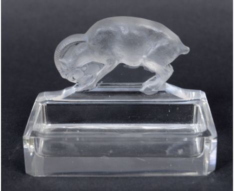 LALIQUE PIN TRAY the clear glass pin tray mounted with a frosted model of a Ram. Signed, R Lalique, France. 4 1/2ins (11cms) 