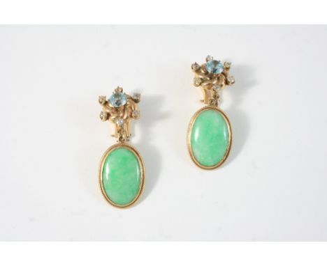 A PAIR OF JADE, DIAMOND AND ZIRCON DROP EARRINGS each set with an oval-shaped jade drop suspended from a gold surmount centre
