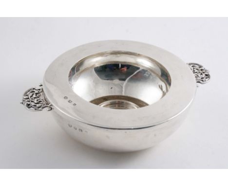 A MODERN TWO HANDLED CAVIAR DISH of squat circular form with a detachable rim (lacking glass liner) by Messrs. Hutton & Sons 