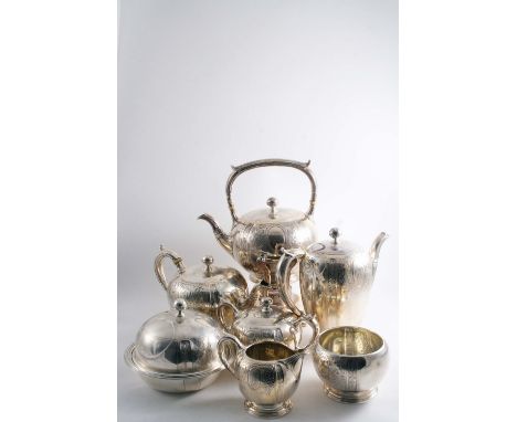 AN AMERICAN SIX-PIECE TEA & COFFEE SERVICE comprising kettle on stand with burner, tea pot, coffee pot, covered sugar bowl, s