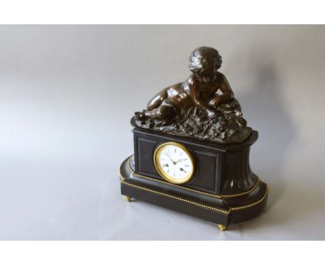 A BLACK MARBLE MANTEL CLOCK dial white enamel, signed Raingo Fres, Paris, movement drum striking on a bell, case surmounted b