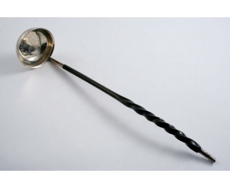 A GEORGE III SCOTTISH PROVINCIAL PUNCH LADLE with a shallow circular bowl & a twisted whalebone handle, maker's mark only, "J