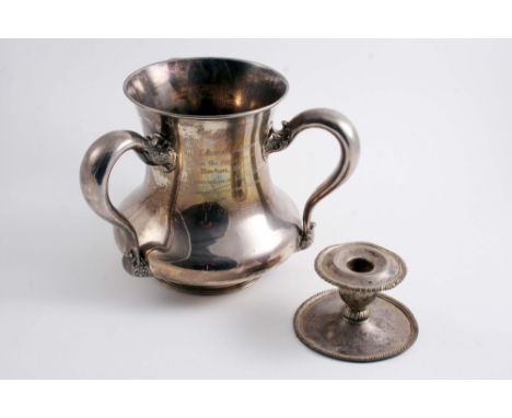 AN EARLY 20TH CENTURY AMERICAN THREE-HANDLED CUP OR TYG of baluster form with a presentation inscription on one side, by the 