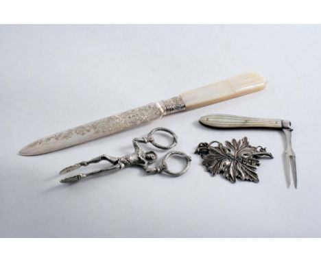 A MIXED LOT: A pair of Victorian Harlequin sugar nips, a mother of pearl handled engraved cake knife, a Victorian folding fru