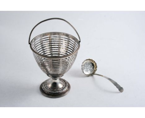 A GEORGE III SWING HANDLED SUGAR BASKET with slot-pierced decoration & bead borders (no liner), marks rubbed, London 1776 & a