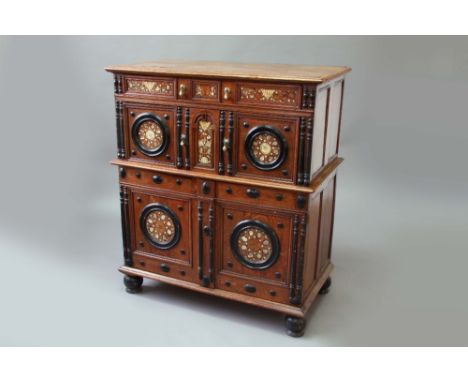 A CHARLES II OAK AND MARQUETRY CHEST OF DRAWERS  in two parts, the upper part with a shallow and deep drawer each inlaid with