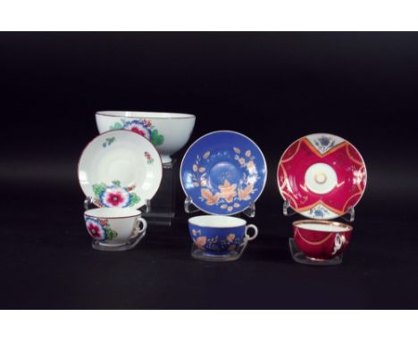 THE RESIDUE OF A GARDNER MOSCOW TEA SERVICE each piece painted with a bold floral spray, comprising; waste bowl, five teacups