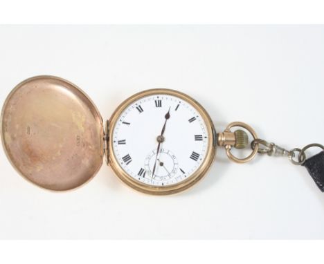 A 9CT. GOLD FULL HUNTING CASED POCKET WATCH the white enamel dial with Roman numerals and subsidiary seconds dial, with prese