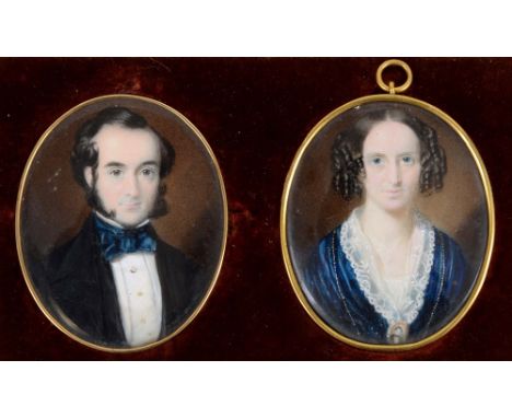 ENGLISH SCHOOL C.1840 A pair of miniature portraits: a gentleman wearing black jacket and his wife wearing blue dress with po