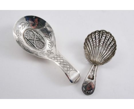 A GEORGE III ENGRAVED CADDY SPOON with an oval filigree panel in the bowl, by Samuel Pemberton, Birmingham 1804 and a George 