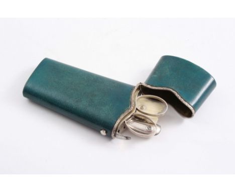 A GEORGE III MOUNTED SHAGREEN ETUI of tapering form fitted with a pair of mounted steel scissors, a mounted steel penknife, a