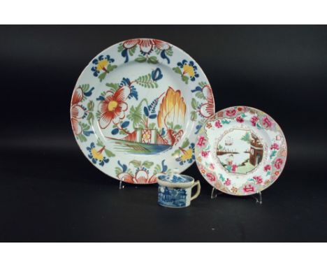 A DELFTWARE POLYCHROME CHINOISERIE PAINTED DISH 13 1/2ins. (34cms.) together with a Spode plate printed with famille rose chi