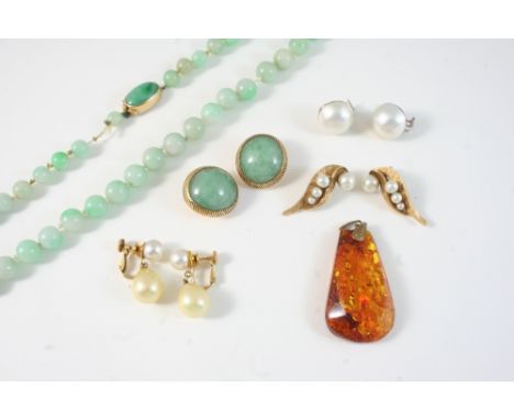 A QUANTITY OF JEWELLERY including a pair of jade and gold clip earrings, a jade necklace and various other items.