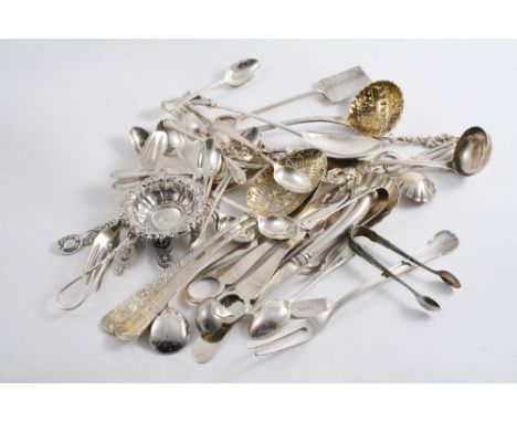 A MIXED LOT: Two parcelgilt "berry" spoons & a sugar sifter ladle,  a pair of fruit serving spoons, a Victorian apostle spoon