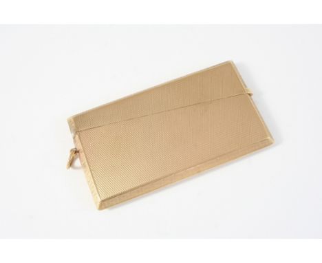 A 9CT. GOLD CARD CASE with engine turned decoration, hallmarked for Birmingham 1929, 5 x 8.5cm., 48 grams.