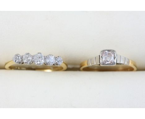 A DIAMOND SOLITAIRE RING set with a cushion-shaped diamond in 18ct. gold, size K, together with a diamond ring, set with four