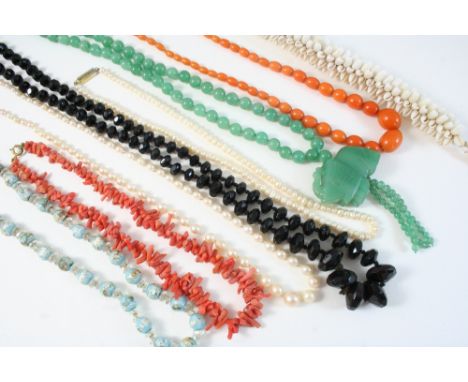 A CORAL NECKLACE 22 grams, a graduated jet necklace, a graduated cultured pearl necklace and various other necklaces.