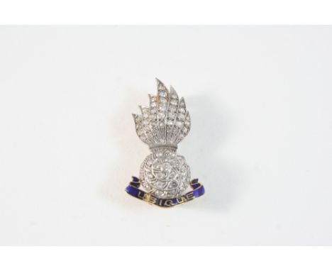 A DIAMOND AND ENAMEL REGIMENTAL BROOCH FOR THE ROYAL ARTILLERY set with circular-cut diamonds, with blue enamel decoration, i