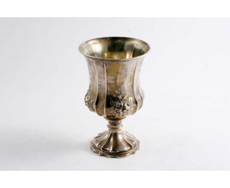 AN EARLY VICTORIAN GOBLET with a fluted, campana shaped bowl, chased floral sprays & a shaped pedestal foot, initialled, by W