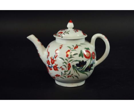 A FIRST PERIOD WORCESTER POLYCHROME TEAPOT AND COVER painted with the Kempthorne pattern, 4 1/2ins. (11.5cms.) dia.