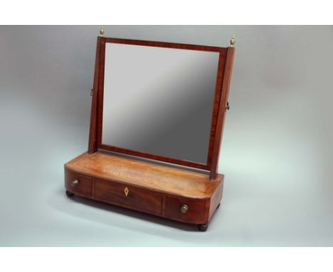 A LATE GEORGE III MAHOGANY TOILET MIRROR a D shaped plinth with caddy moulded edge and fitted with three short drawers,  22 1