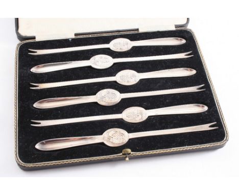 A MODERN CASED SET OF SIX LOBSTER PICKS by Messrs. Hutton & Sons Ltd., Sheffield 1938;  each one 7.7"  (19.5 cms) long;  7 oz