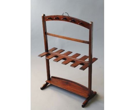 AN EARLY 19TH CENTURY MAHOGANY WHIP/BOOT STAND 37 3/4ins. (96cms.) high overall, 24 1/2ins. (62cms.) wide