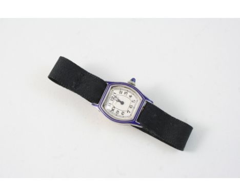 AN ART DECO LADY'S PLATINUM AND BLUE ENAMEL WRISTWATCH BY CARTIER the signed tonneau-shaped dial with Arabic numerals, with b