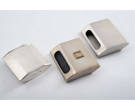 TWO MODERN ENGINE-TURNED MATCHBOX HOLDERS of rhombic form (one with an applied gold monogram) and another of a similar form, 