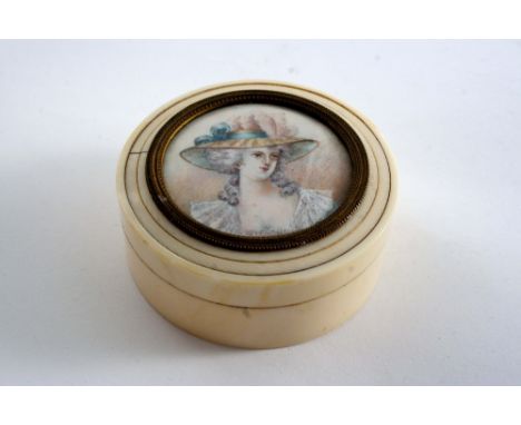 A 19TH CENTURY EARLY CIRCULAR IVORY BOX & COVER inset with the portrait miniature of a girl in a hat;  3.1"  (8 cms) diameter