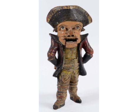 A CARVED AND PAINTED WOOD NUTCRACKER in the form of a sailor, early 19th century;  28 cms