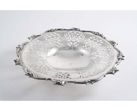 A VICTORIAN PIERCED DISH of shaped circular outline with a lobed circular foot & engraving, by H. Wilkinson & Co., Sheffield 