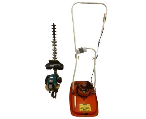Makita HTR5600 22-inch petrol hedge trimmer and Flymo TL KT12ADV Kawasaki 2 stroke engine petrol hover lawnmower. - THIS LOT 