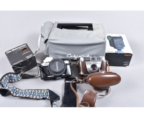 A Yashica FX-D Quartz SLR Camera and Accessories, with a Yashica ML 50mm f/2 lens, a Kodak Retinette 1B 35mm viewfinder camer