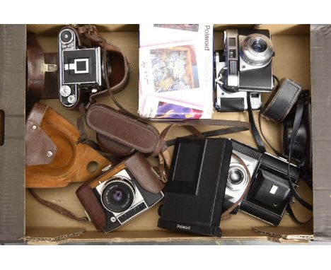 A Pentina SLR Camera, a Reflex-Korelle SLR Body and others, with a Polaroid 636 Closeup camera, a Braun Paxette Super III bod