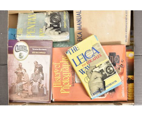 A Tray of Camera and Photo Technique Books, including books on Leica, Canon, Pentax, a History of Photography book, The Mediu