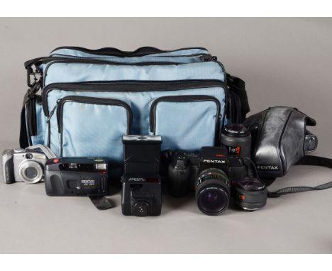 A Pentax SFXn AF SLR Camera Outfit, serial no 4964345, a 28-80mm f/3.5-4.5 lens, a 50mm f/1.4 lens, a 70-210mm f/4-5.6 all SM