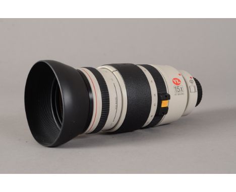 A Canon CL 8-120mm Video Zoom Lens, 15x AF Macro, f/1.4-2.1 with a Canon Extender CL 2x and a collapsible lens hood