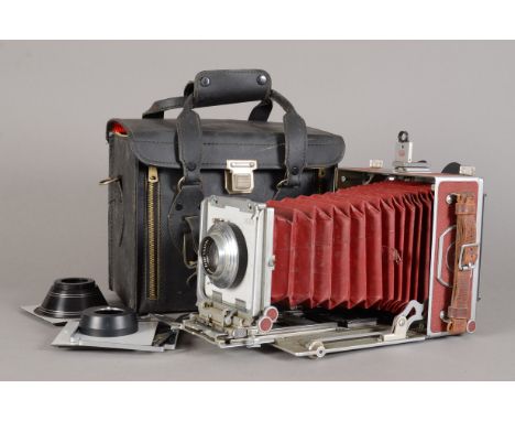 An MPP 5 x 4" Micro-Technical Mark VII Camera, serial no 9539, red panel coverings, with a Schneider-Kreuznach Xenar 150mm f/