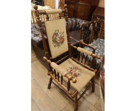A Victorian tapestry upholstered turned framed armchair