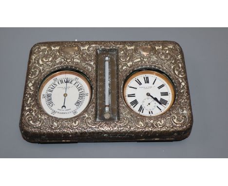 An Edwardian repousse silver mounted combination pocket watch, barometer and thermometer desk stand (a.f.), by Mappin &amp; W