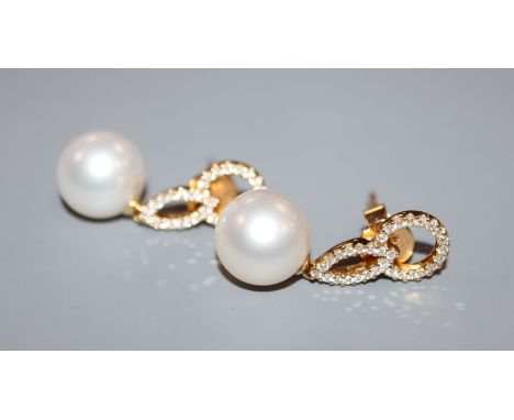 A pair of 18ct yellow gold, pearl and grain-set diamond drop earrings, 26mm.