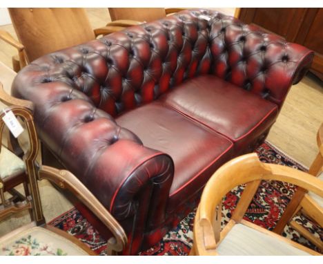 A Thomas Lloyd leather button back chesterfield W.160cm