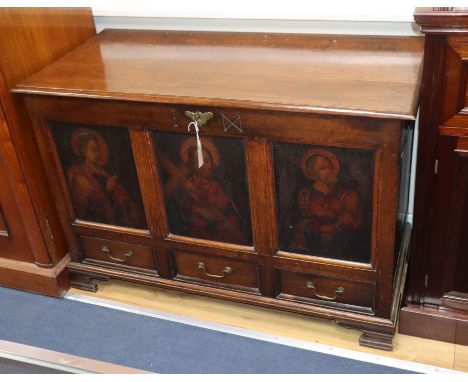 A mid 19th century oak mule chest, the front panels oil painted with three late 16th century studies of Saints, over three sm