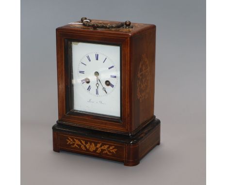 A 19th century French marquetry inlaid rosewood mantel clock