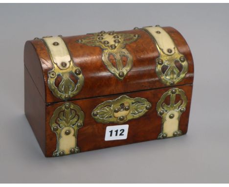 A dome topped horn and brass bound walnut tea caddy length 20cm